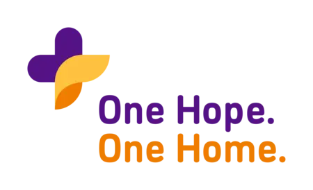 Ökumene-Logo der EKD: One Hope. One Home.: Das Herz steht für die emotionale Übersetzung der gemeinsamen Hoffnung auf Christus (One Hope). Das Dach steht für das gemeinsame Zuhause in der Welt (One Home).